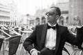 Portrait of confident man in tuxedo and bow tie Royalty Free Stock Photo