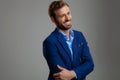 Portrait of confident smart casual man looking down to side