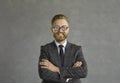 Portrait of a confident smiling handsome caucasian businessman in glasses with magnifying lenses. Royalty Free Stock Photo