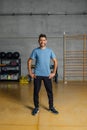 Confident Smiling sportsman looking at camera in fitness center club. Royalty Free Stock Photo