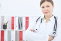 Portrait of a confident smiling medical doctor woman with stethoscope. Royalty Free Stock Photo