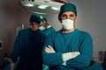 Portrait of confident surgical team leader in sterile operating room. Royalty Free Stock Photo