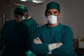 Portrait of confident surgical team leader in sterile operating room. Royalty Free Stock Photo