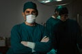 Portrait of confident surgical team leader in sterile operating room. Royalty Free Stock Photo