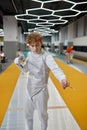 Portrait of confident teenage boy fencer with sharp sword Royalty Free Stock Photo