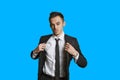 Portrait of a confident young businessman over colored background Royalty Free Stock Photo