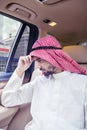 Confused Arabian man sitting in the car Royalty Free Stock Photo