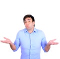 Portrait of confused clueless young man against white background Royalty Free Stock Photo