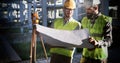 Portrait of construction engineers working on building site Royalty Free Stock Photo