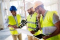 Portrait of construction engineers working on building site Royalty Free Stock Photo