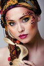 Portrait of contemporary noblewoman with face art Royalty Free Stock Photo