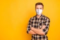 Portrait of content guy wearing n95 modern respirator air smog pollution problem copy space isolated on bright yellow