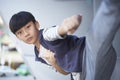 Portrait of cool Asian kid posing outdoors Royalty Free Stock Photo