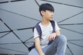 Portrait of cool Asian kid posing outdoors Royalty Free Stock Photo