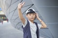 Portrait of cool Asian kid posing outdoors Royalty Free Stock Photo