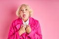 Portrait of cool careless carefree granny having fun free time leisure isolated pink background