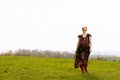 Portrait of cool fashionable woman wearing dress boots and shade Royalty Free Stock Photo