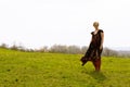 Portrait of cool fashionable woman wearing dress boots and shade Royalty Free Stock Photo