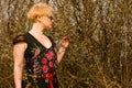 Portrait of cool fashionable woman wearing dress and shades Royalty Free Stock Photo