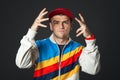 Portrait of cool looking young guy posing in studio.