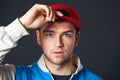 Portrait of cool looking young guy posing in studio. Royalty Free Stock Photo