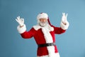 Portrait of cool Santa Claus on color background Royalty Free Stock Photo