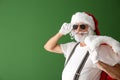 Portrait of cool Santa Claus on color background Royalty Free Stock Photo