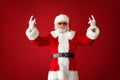 Portrait of cool Santa Claus on color background Royalty Free Stock Photo