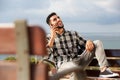 Cool young arabic man talking on mobile phone outdoors Royalty Free Stock Photo