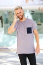 Cool young man with beard talking on mobile phone Royalty Free Stock Photo
