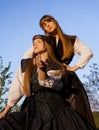 Portrait of a couple of beautiful young girls in traditional Ukrainian clothes Royalty Free Stock Photo