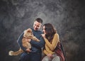 Portrait of couple with big ginger cat Royalty Free Stock Photo