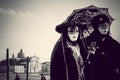 Couple of carnival black masks in Venice