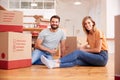 Portrait Of Couple Celebrating Moving Into New Home Drinking Champagne Royalty Free Stock Photo