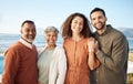 Portrait, couple and elderly parents at beach on holiday, vacation or travel. Face, family men and women at ocean for Royalty Free Stock Photo