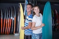 Portrait of couple is satisfied of choose surfboard Royalty Free Stock Photo