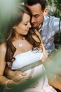 Couple expecting a child shares intimate moments in the nature Royalty Free Stock Photo