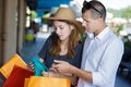 portrait couple with shopping bags Royalty Free Stock Photo
