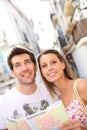 Portrait of couple travelling and visiting monuments Royalty Free Stock Photo