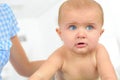 Portrait crawling baby on bed