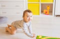 Portrait of crawling funny baby boy indoors at home Royalty Free Stock Photo
