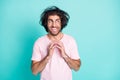 Portrait of crazy genius uncombed hairdo guy arms together look empty space wear spectacles pastel pink t-shirt isolated