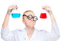 Portrait of a crazy lab assistant with two colored substance bulbs on a white background