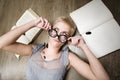 Portrait of crazy student in glasses with books and cockroaches Royalty Free Stock Photo