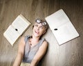 Portrait of crazy student in glasses with books and cockroaches Royalty Free Stock Photo