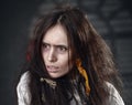 Portrait of a crazy woman in a straitjacket Royalty Free Stock Photo