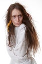 Portrait of a crazy woman in a straitjacket Royalty Free Stock Photo