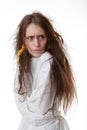Portrait of a crazy woman in a straitjacket Royalty Free Stock Photo