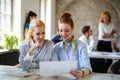 Portrait of creative business people team working together and smiling in office. Royalty Free Stock Photo