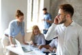 Portrait of creative business people team working together and smiling in office. Royalty Free Stock Photo